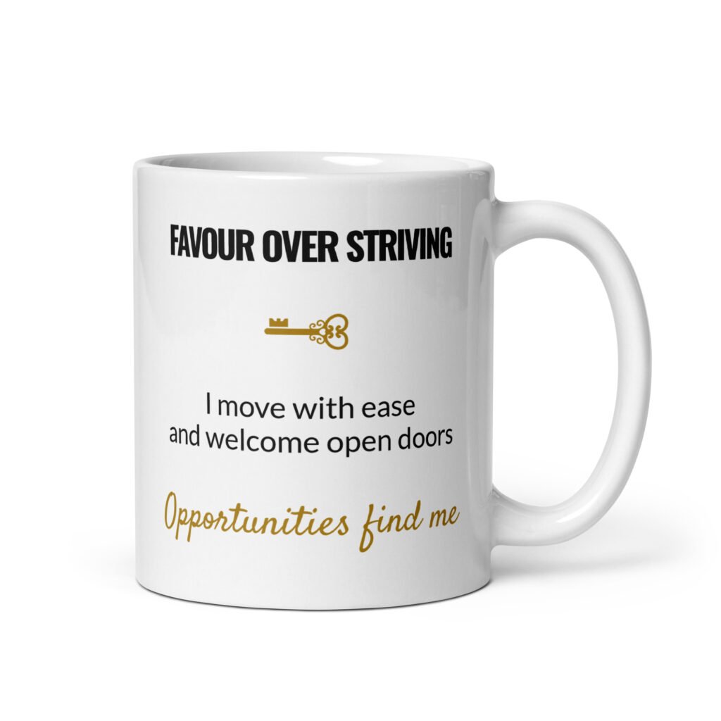 Favour Over Striving Mug, white ceramic 11 oz mug shown with the handle on the right