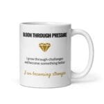 White ceramic Bloom Through Pressure affirmation mug with handle on the right