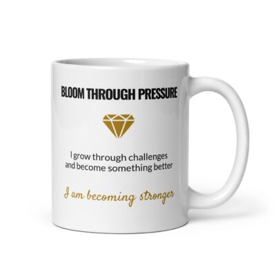 White ceramic Bloom Through Pressure affirmation mug with handle on the right