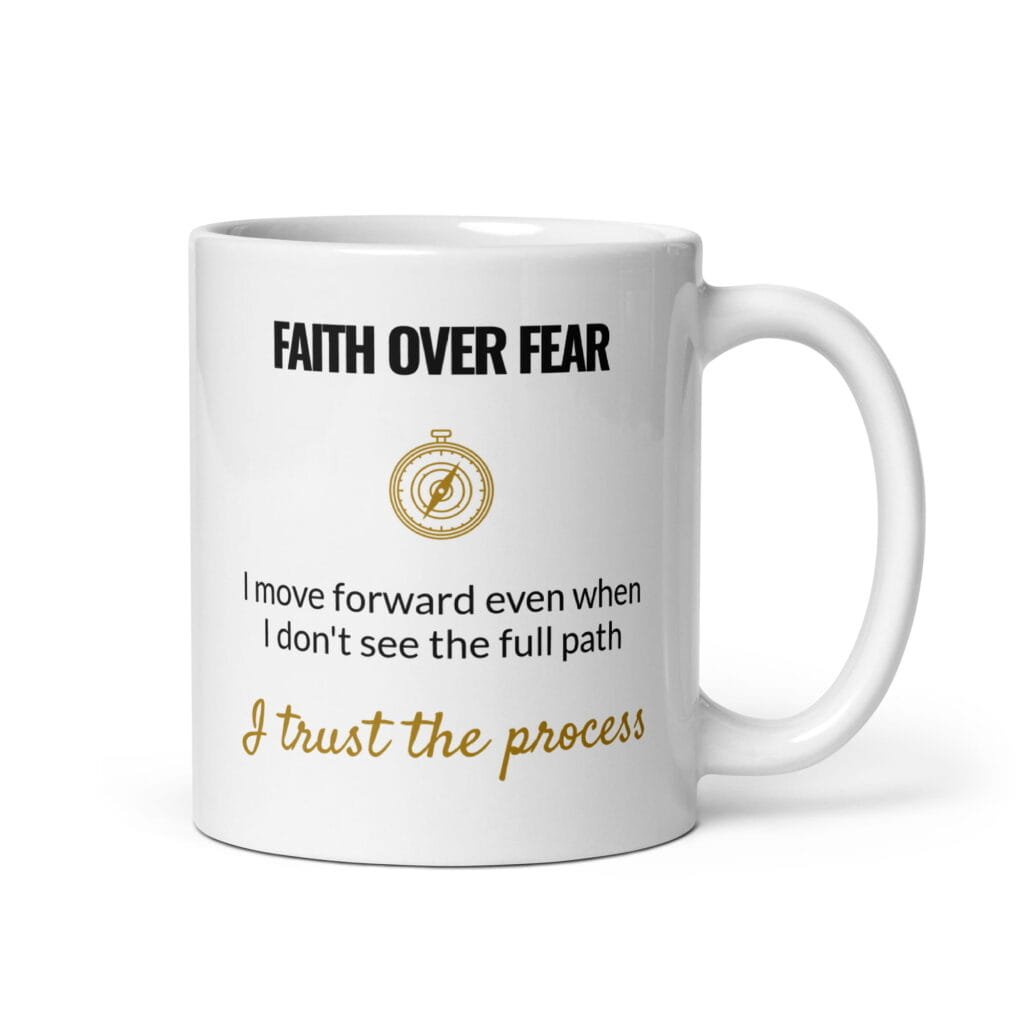 Faith Over Fear Mug, white ceramic 11 oz mug shown with the handle on the right