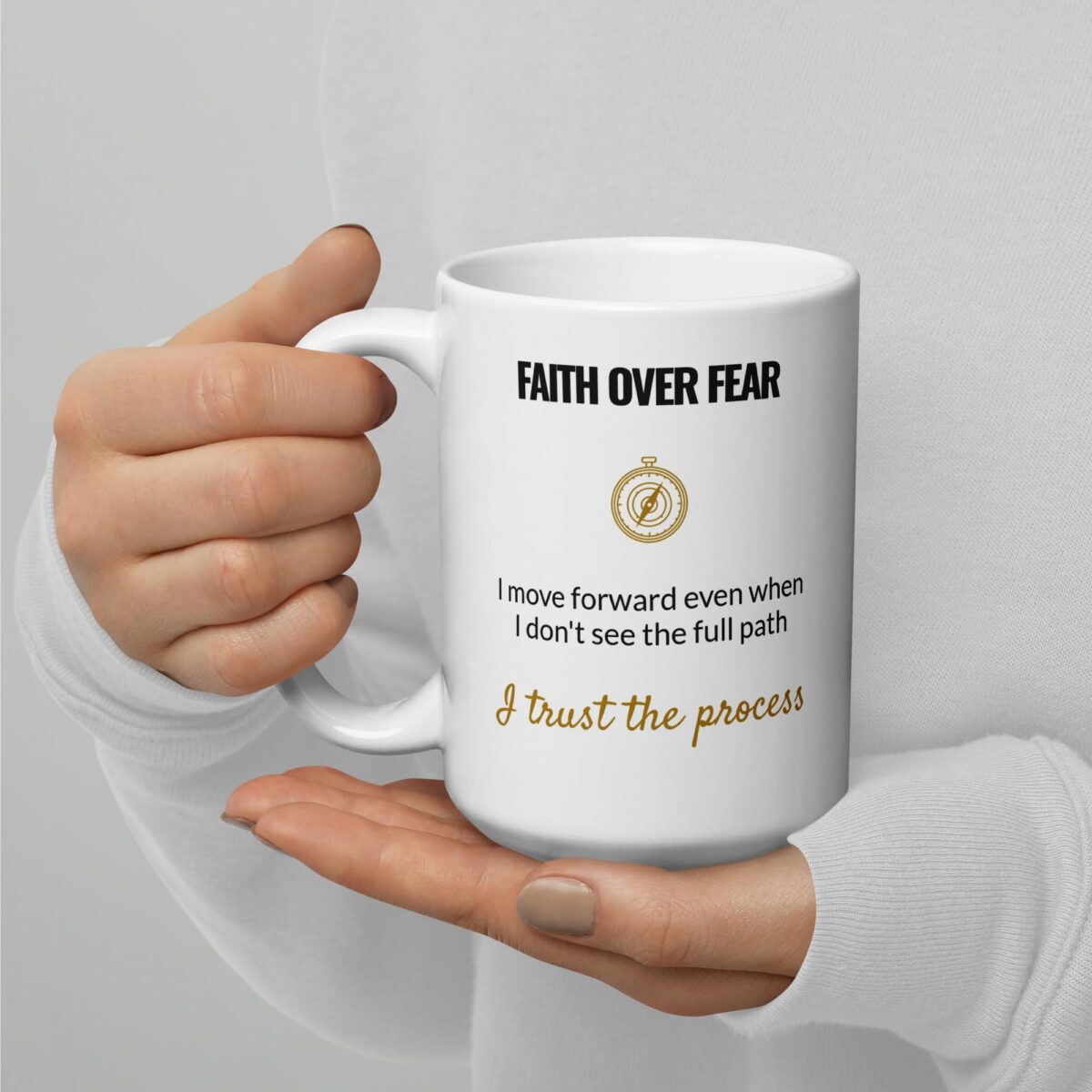 Faith Over Fear Mug, white ceramic 15 oz mug shown with the handle on the left
