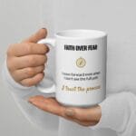 Faith Over Fear Mug, white ceramic 15 oz mug shown with the handle on the left
