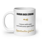 Favour Over Striving Mug, white ceramic 20 oz mug shown with the handle on the left